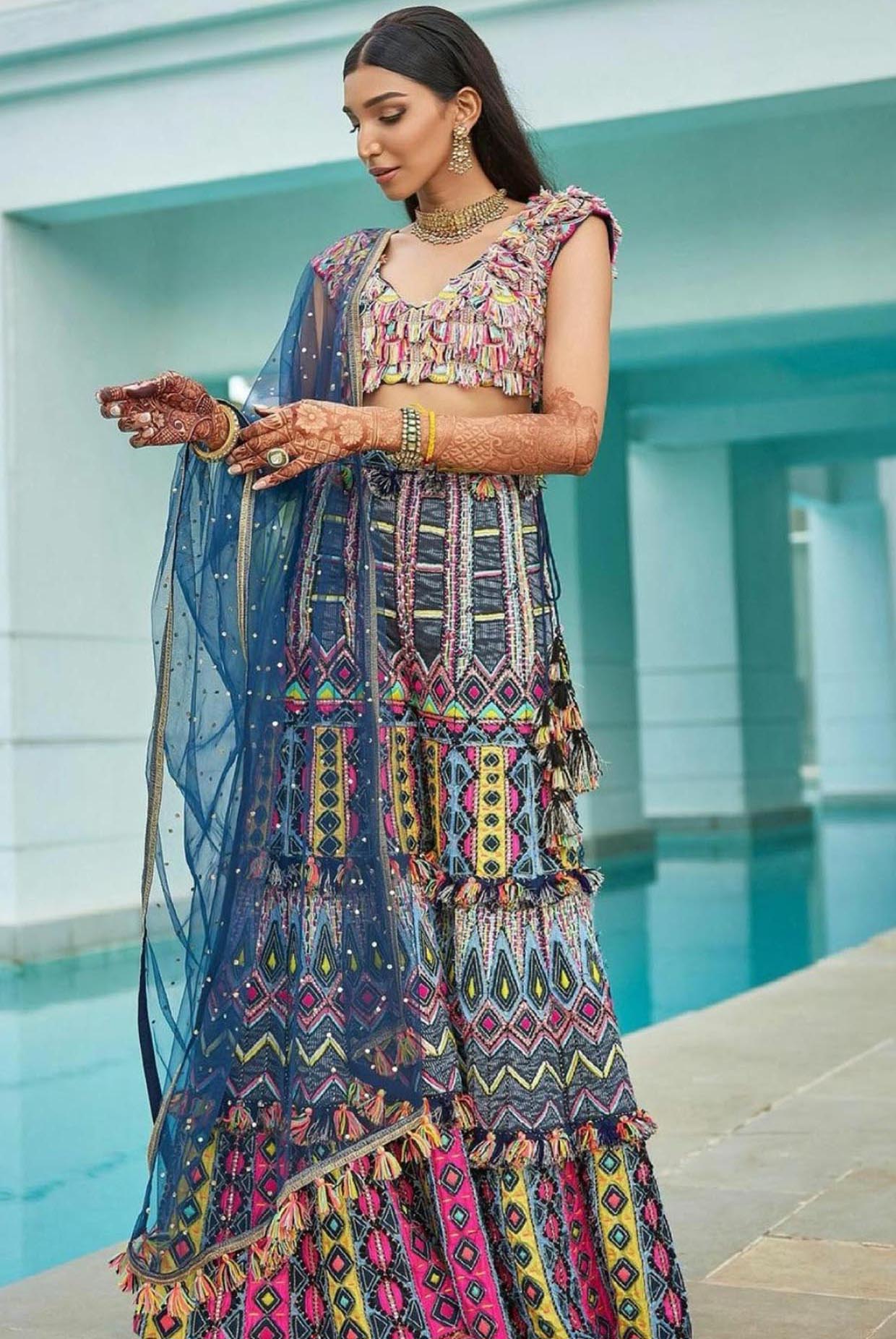 Navy Blue Georgette Embroidered Choli And Sharara With Mukaish Net Dupatta.