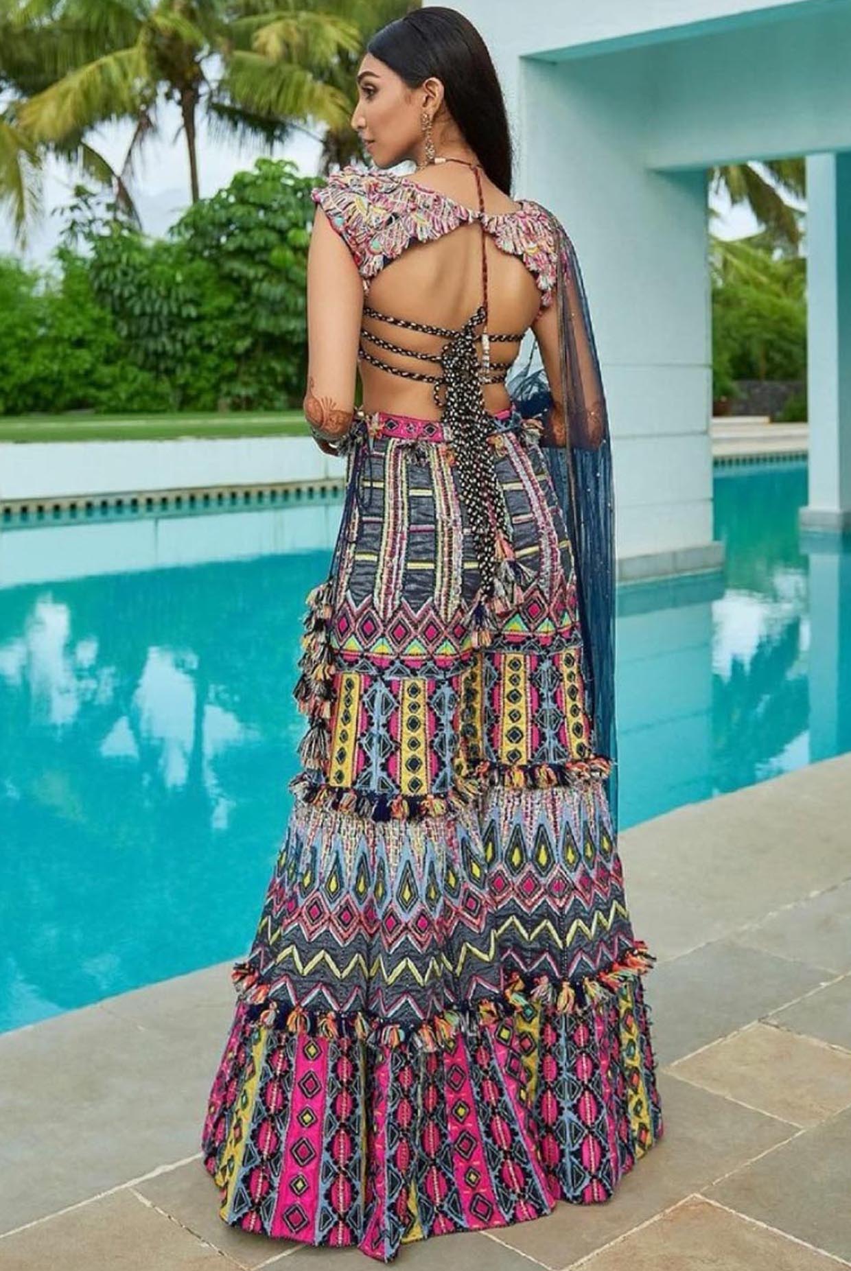 Navy Blue Georgette Embroidered Choli And Sharara With Mukaish Net Dupatta.