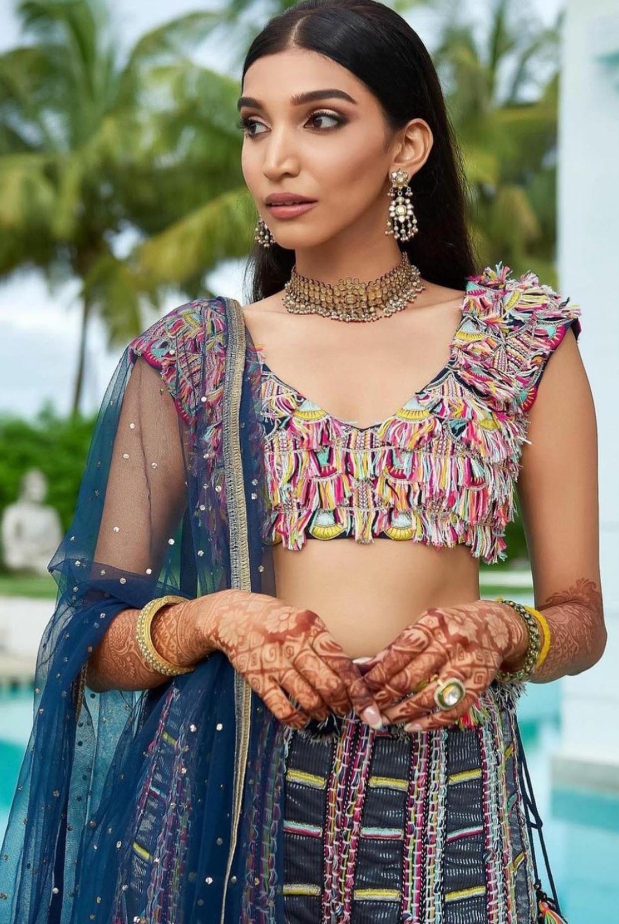 Navy Blue Georgette Embroidered Choli And Sharara With Mukaish Net Dupatta.