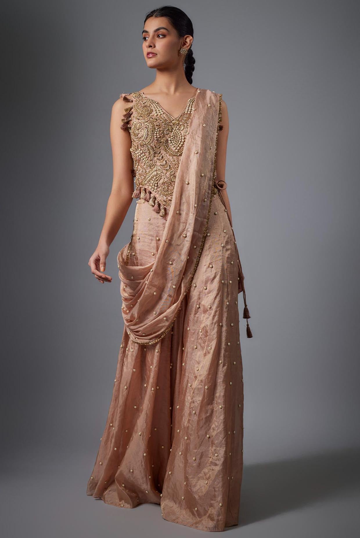 Dull Rose Tissue Embroidered Tissue Choli And Embroidred Sharara With Pallu.