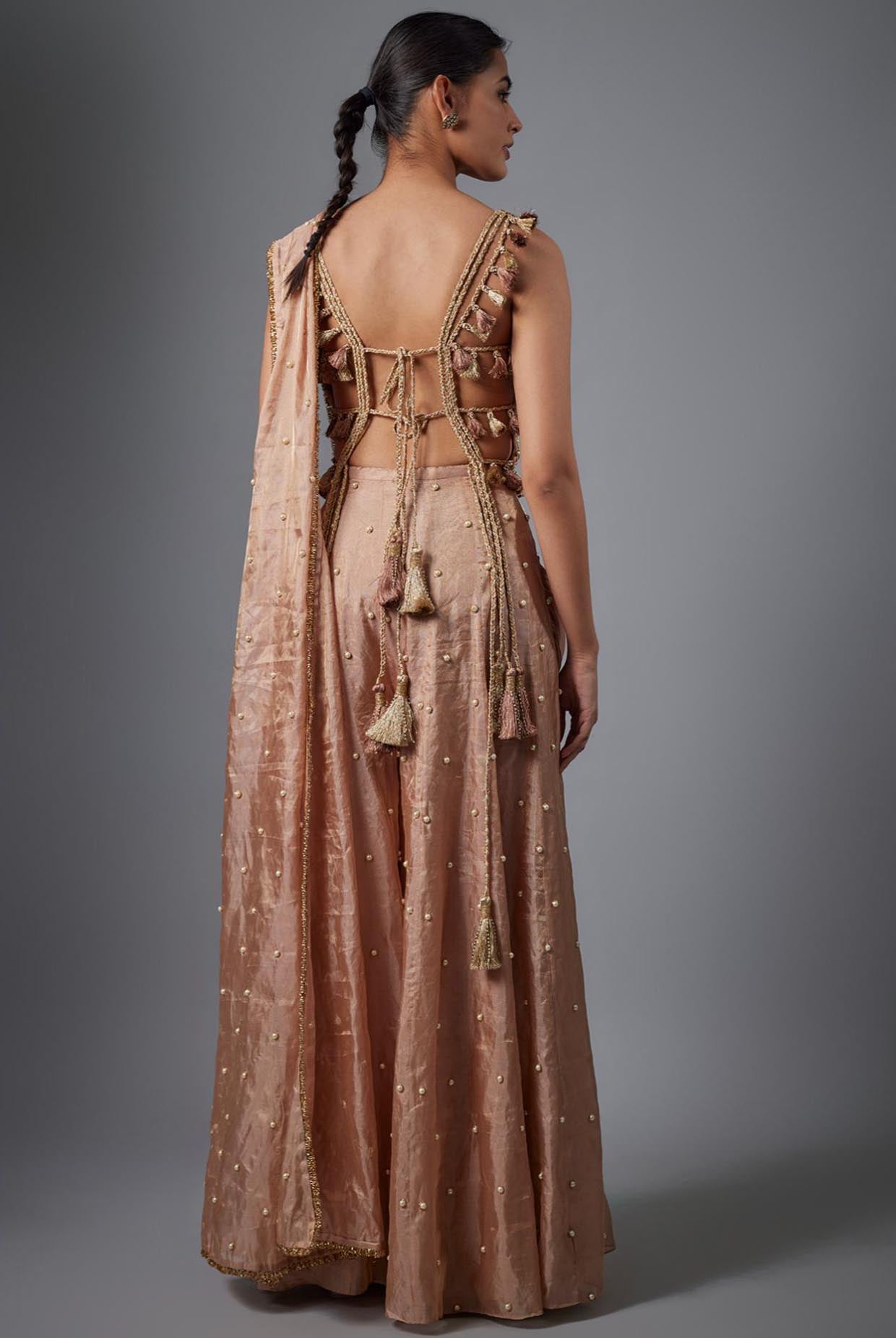 Dull Rose Tissue Embroidered Tissue Choli And Embroidred Sharara With Pallu.