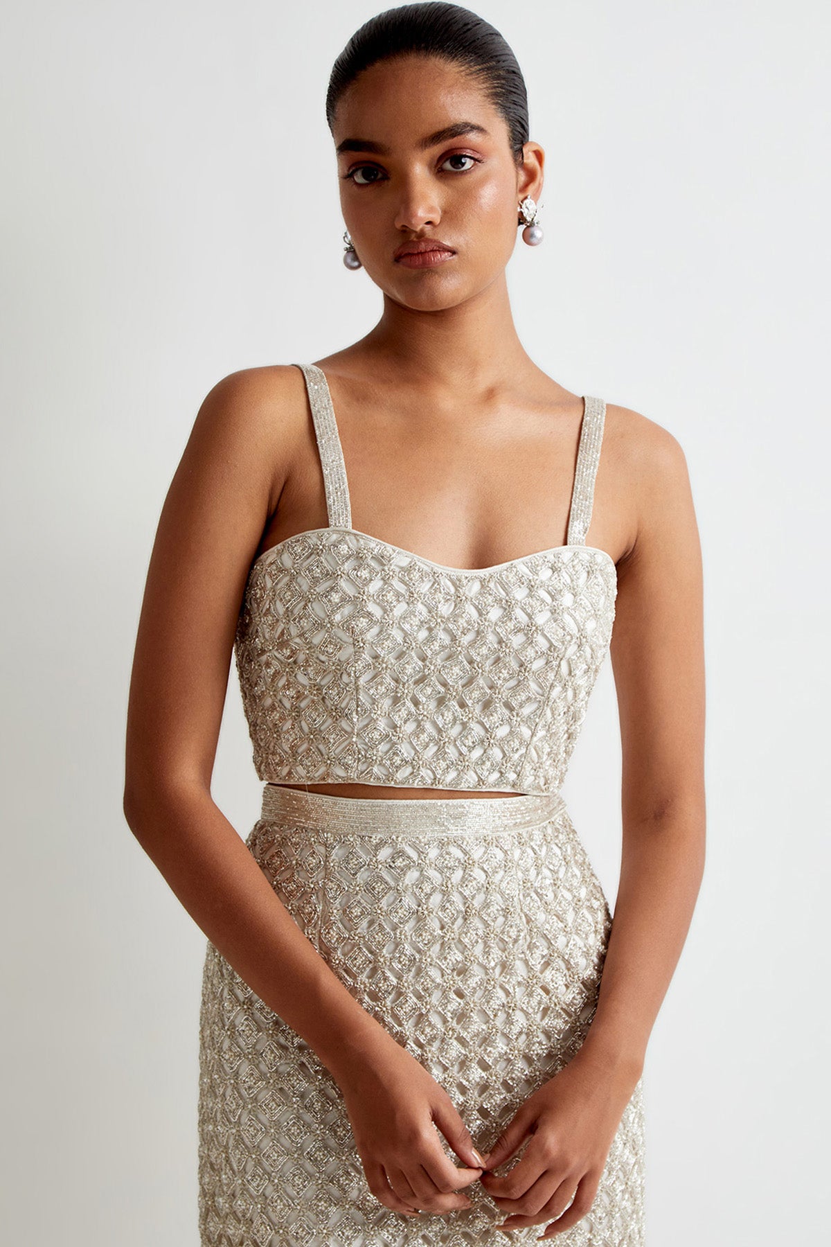 Off-White Georgette Cut Work Embroidered Choli With Detachable Straps And Straight Fit Skirt With Side Slit