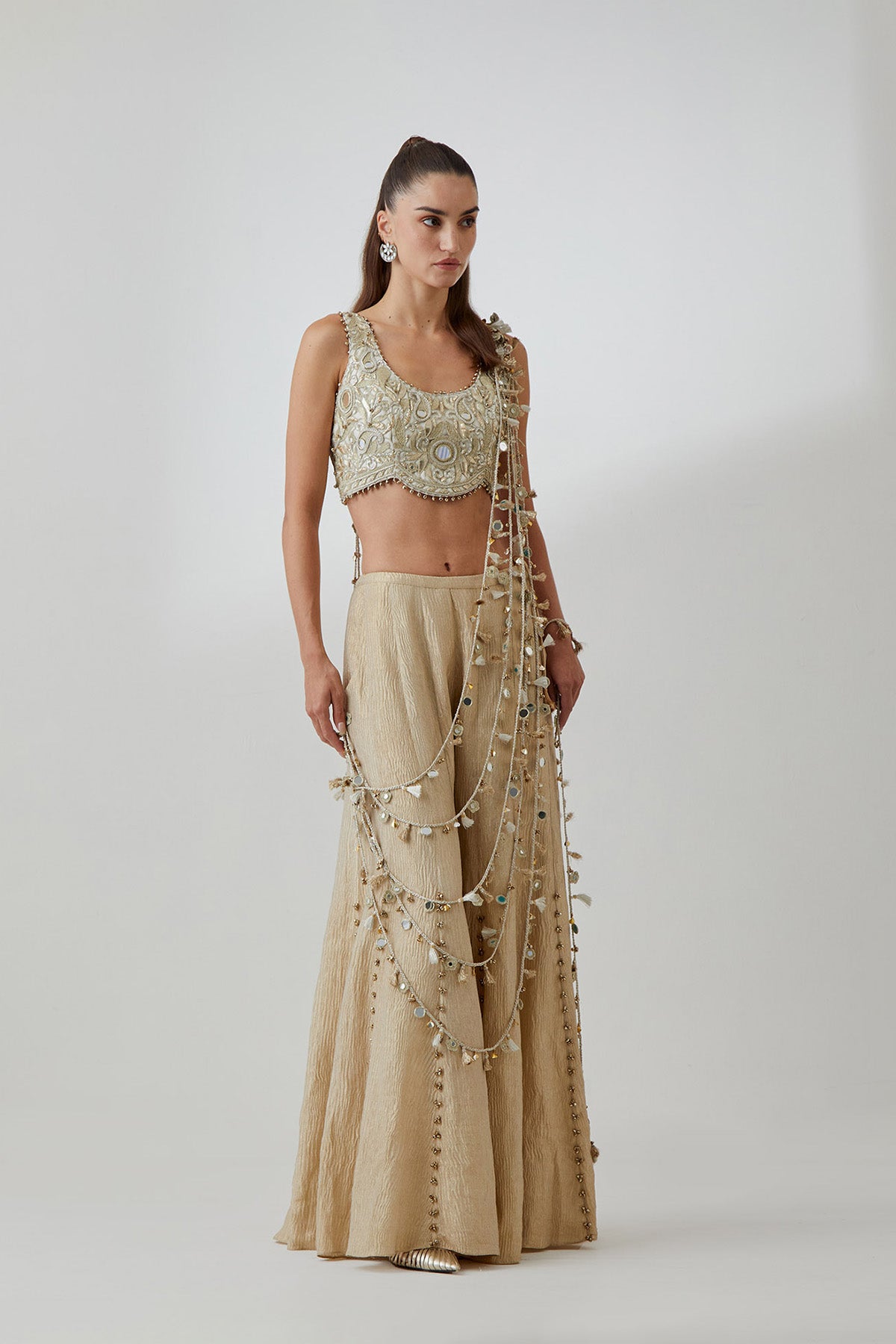 Off-White Organza Embroidered Choli And Gold Crushed Tissue Sharara With Attached Dori Tassels