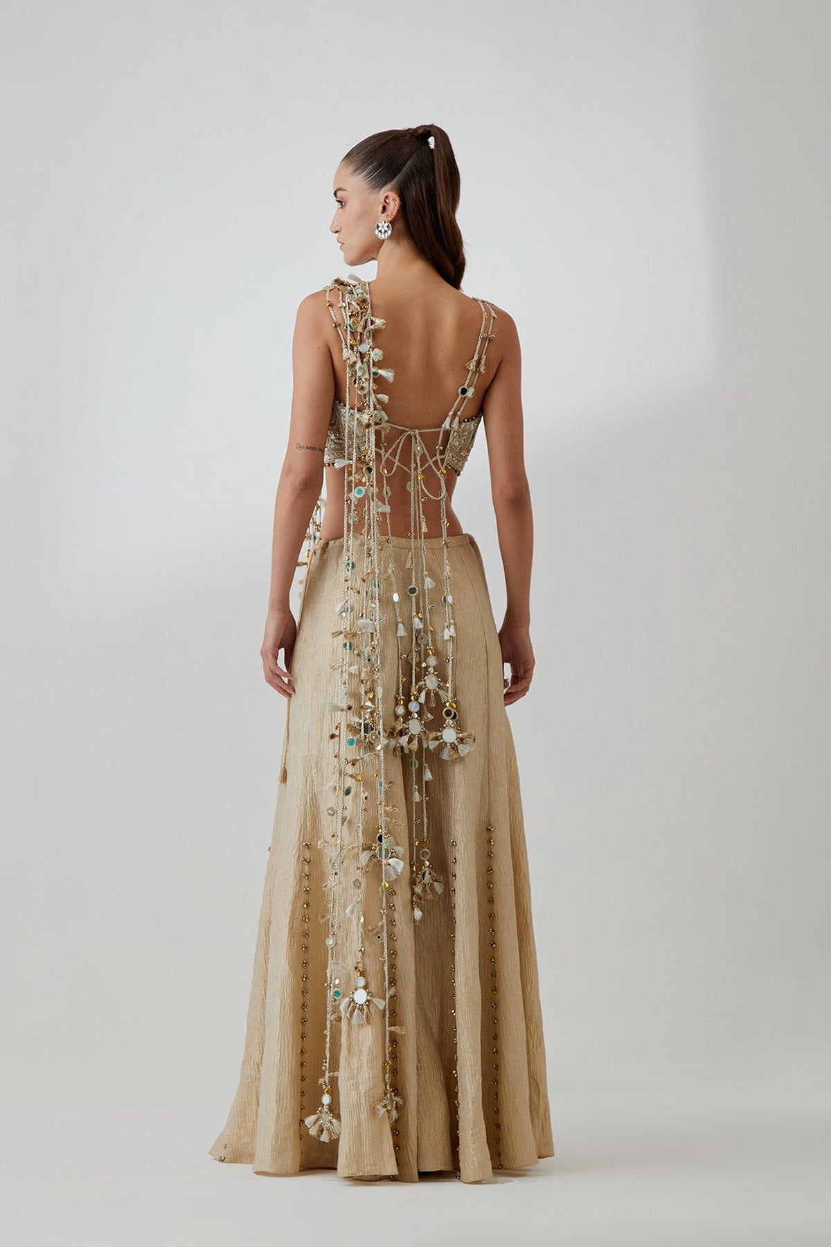 Off-White Organza Embroidered Choli And Gold Crushed Tissue Sharara With Attached Dori Tassels