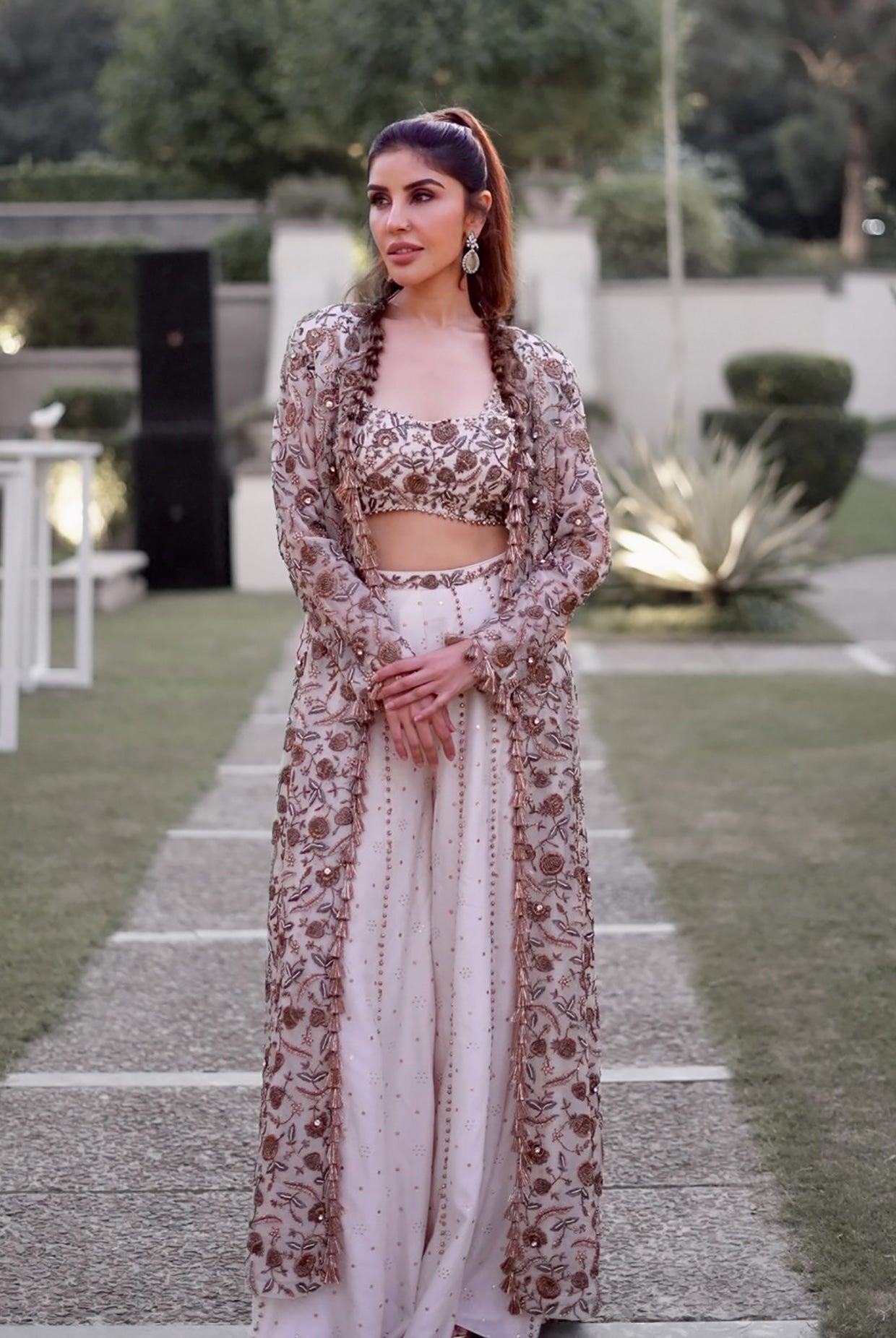 Off-White Georgette Embroidered Choli And Mukaish Silkmul Sharara With Organza Embroidered Jacket With Tassels.