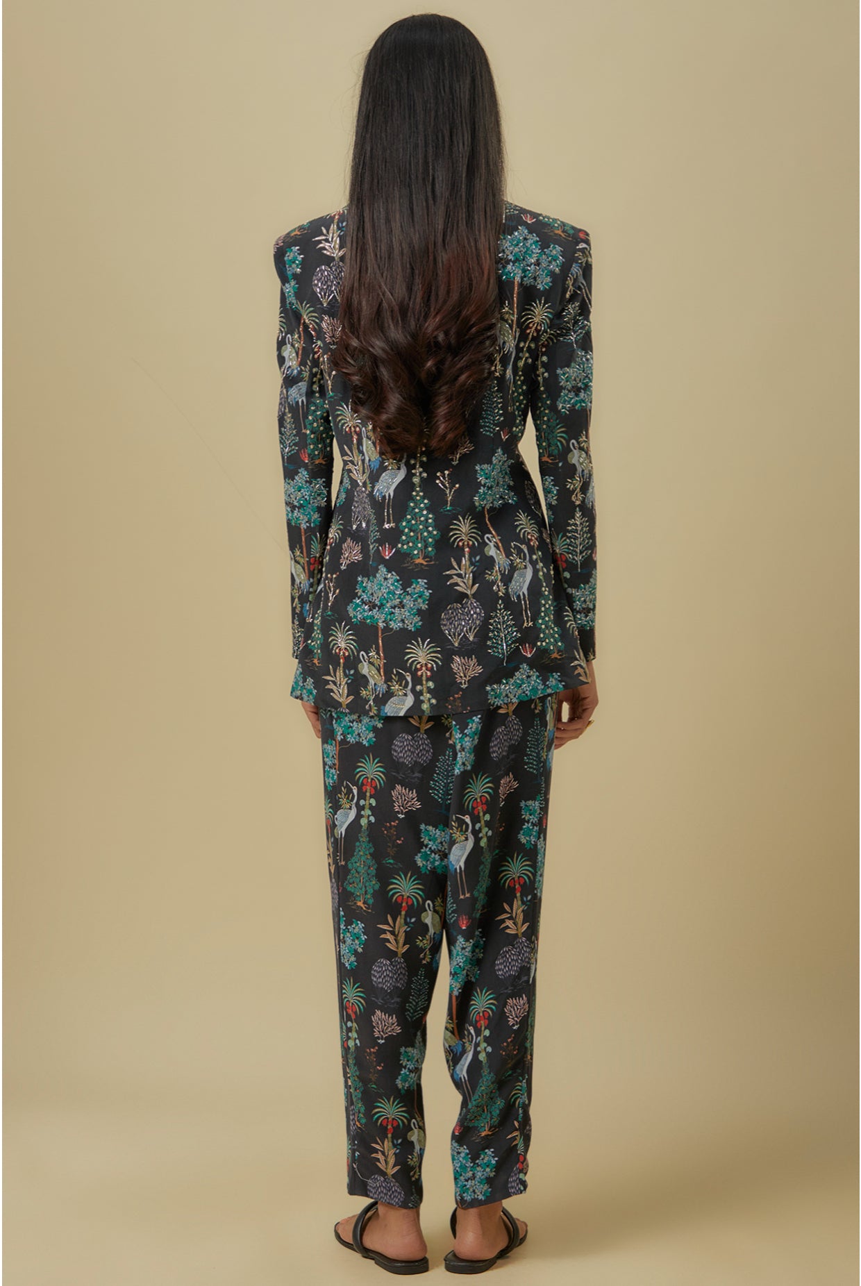 Black Crane Print Lifted Jacket With Plain Bustier And Pants.