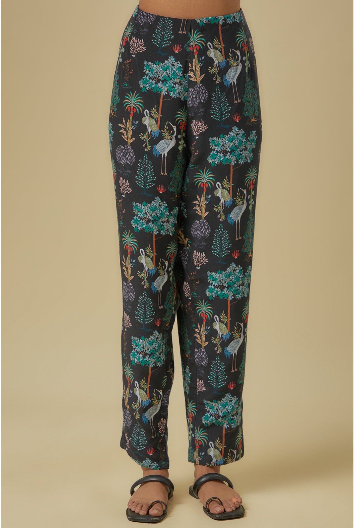 Black Crane Print Lifted Jacket With Plain Bustier And Pants.