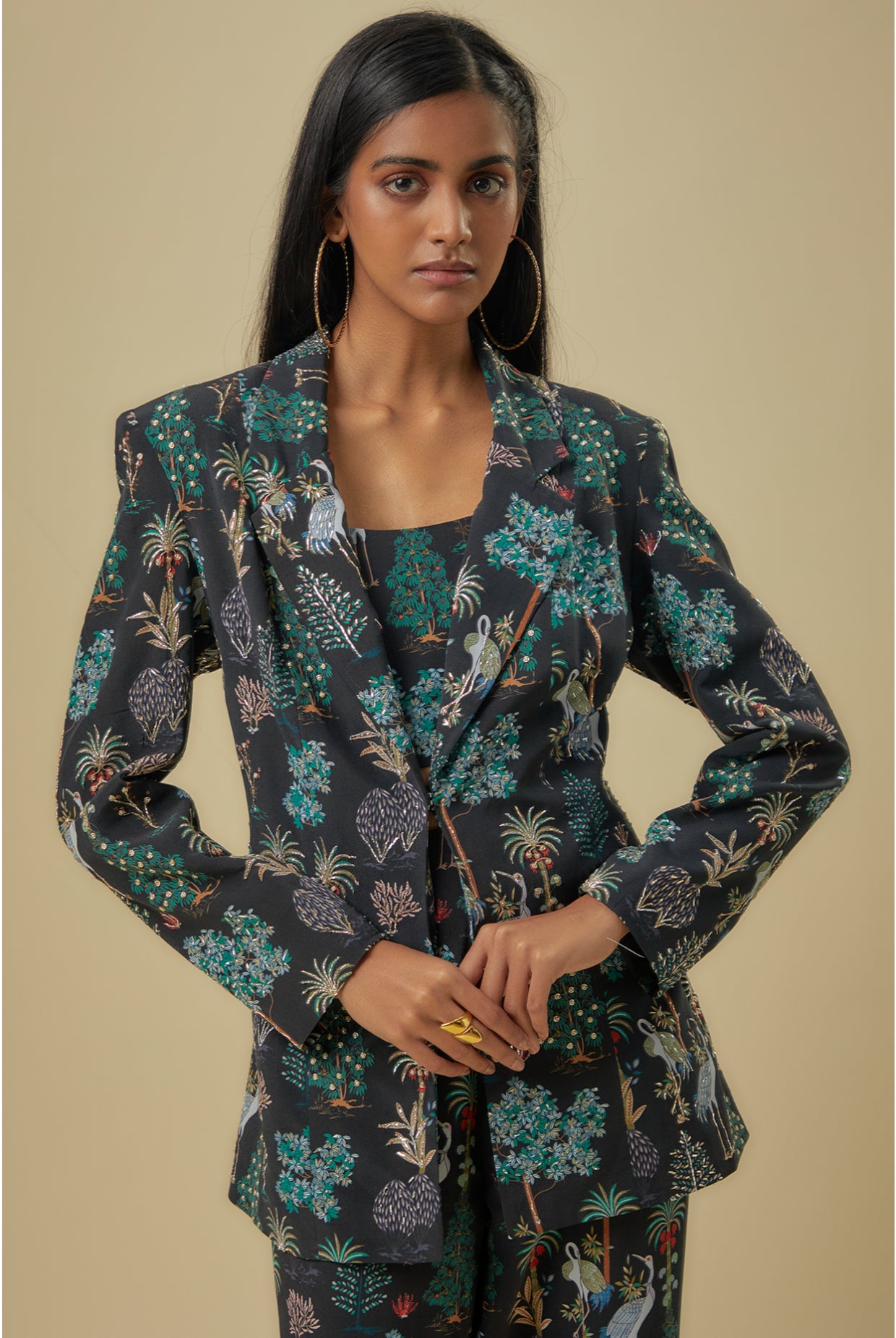 Black Crane Print Lifted Jacket With Plain Bustier And Pants.
