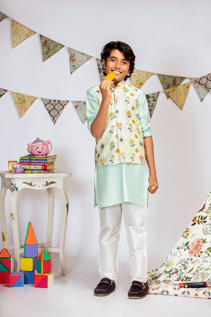Cream Printed Silkmul Bandi with Aqua Cotton Silk Kurta and Off white Cotton Silk Churidar