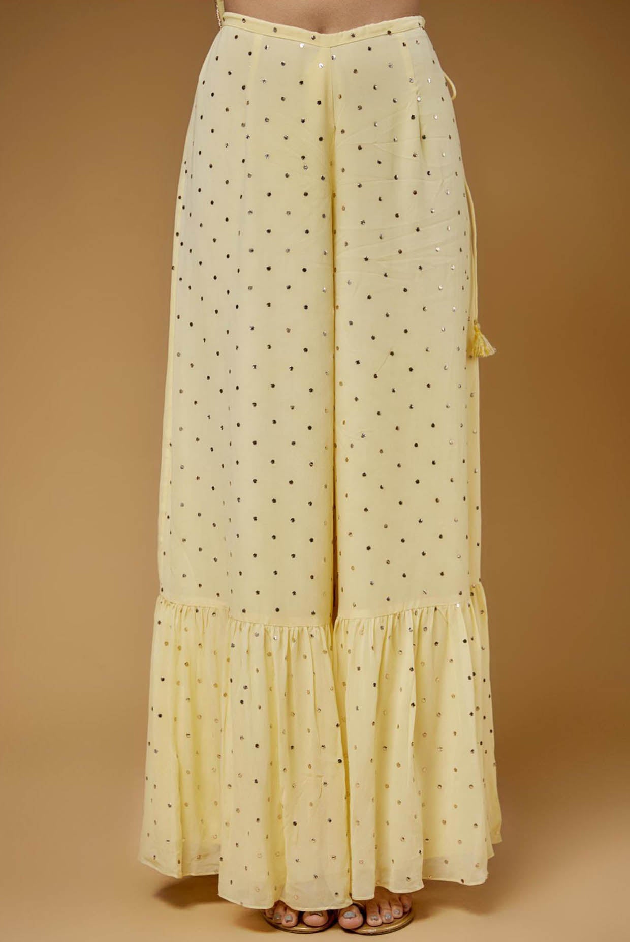 Pale Yellow Embroidered Back Tie-Up Kurta With One Frill Sharara And Dupatta