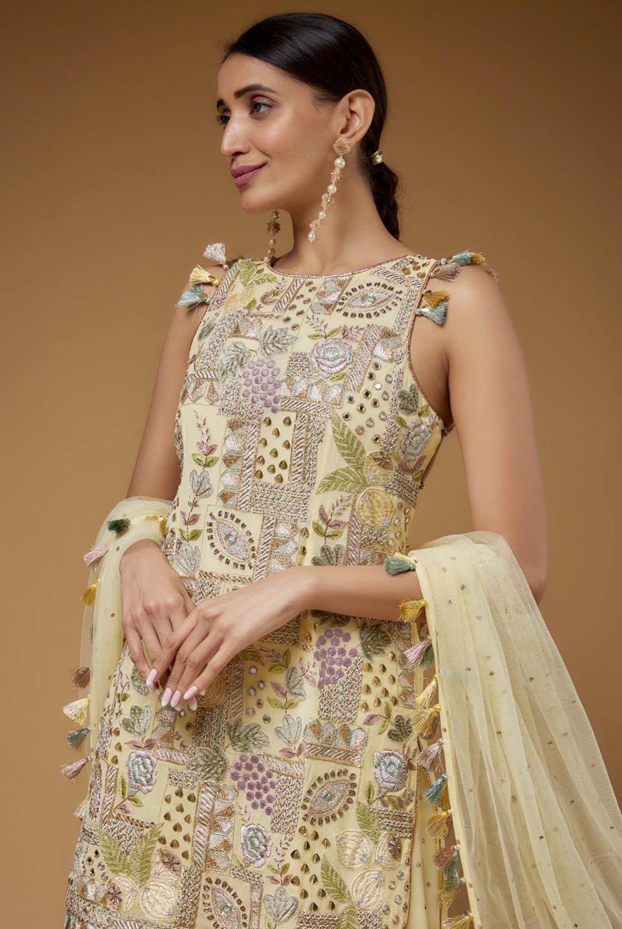 Pale Yellow Embroidered Back Tie-Up Kurta With One Frill Sharara And Dupatta