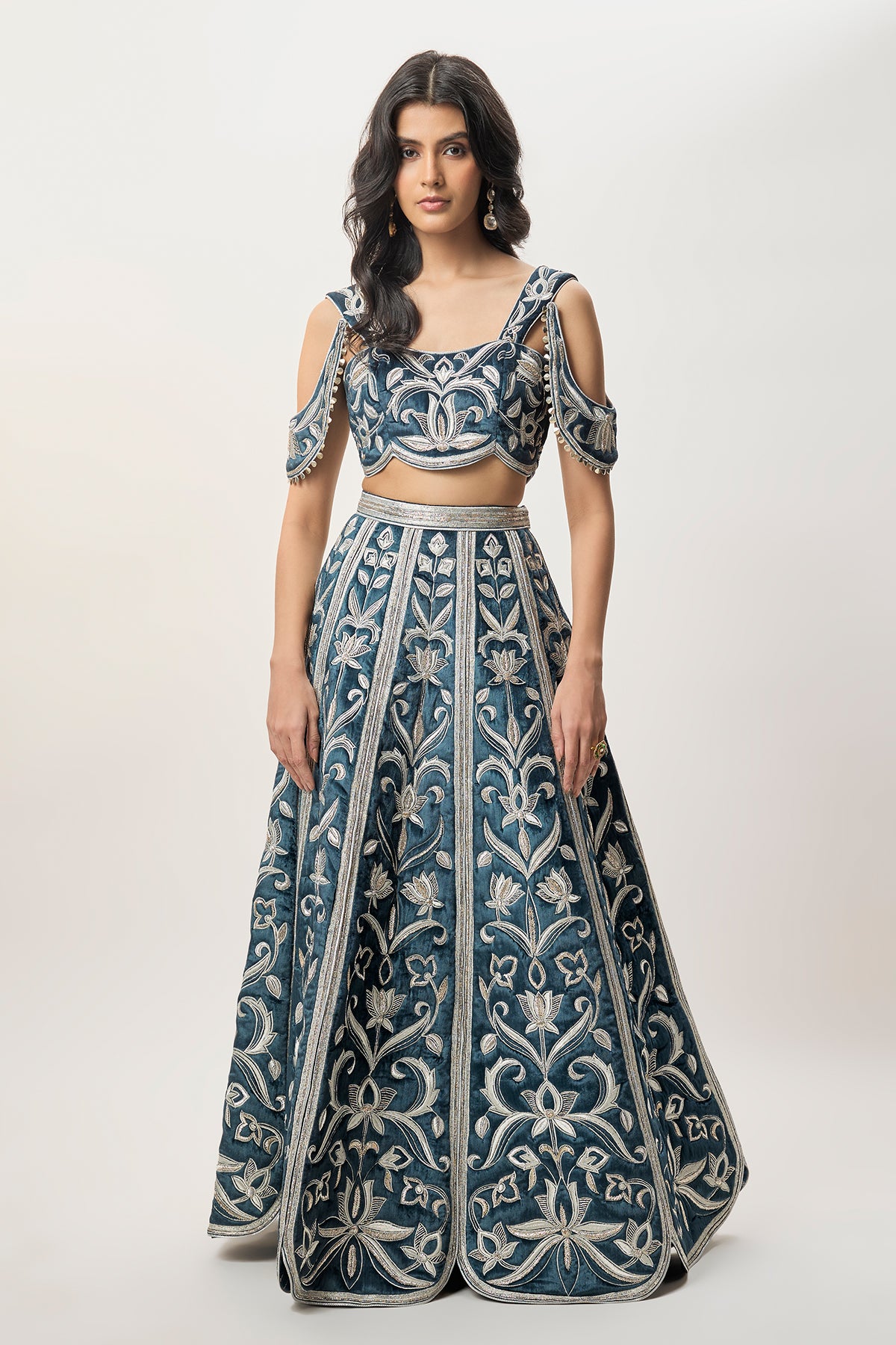 Sahar Navy Blue Velvet Quilted Embroidered Choli With Attached Embroidered Bajuband And Quilted Lehenga.