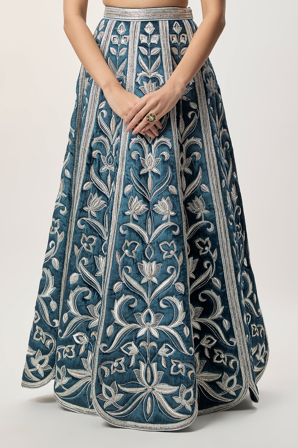 Sahar Navy Blue Velvet Quilted Embroidered Choli With Attached Embroidered Bajuband And Quilted Lehenga.