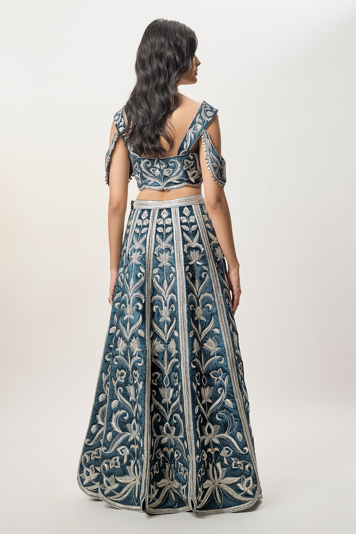 Sahar Navy Blue Velvet Quilted Embroidered Choli With Attached Embroidered Bajuband And Quilted Lehenga.