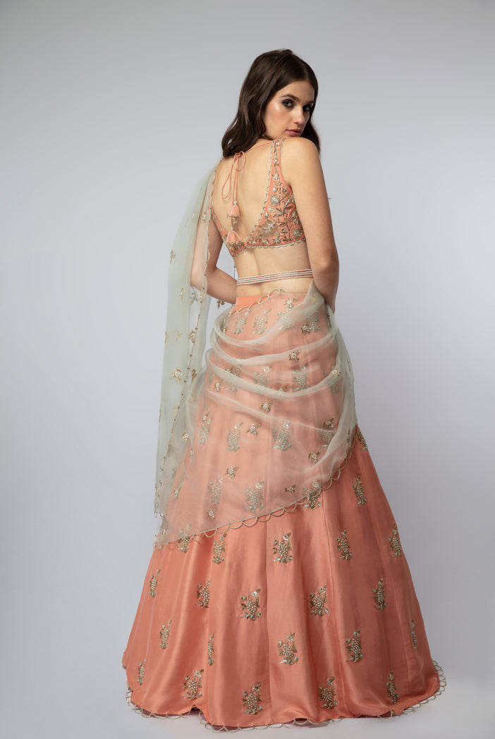 Coral Silk Choli with Lehenga and Mint Organza Dupatta with Waist Belt