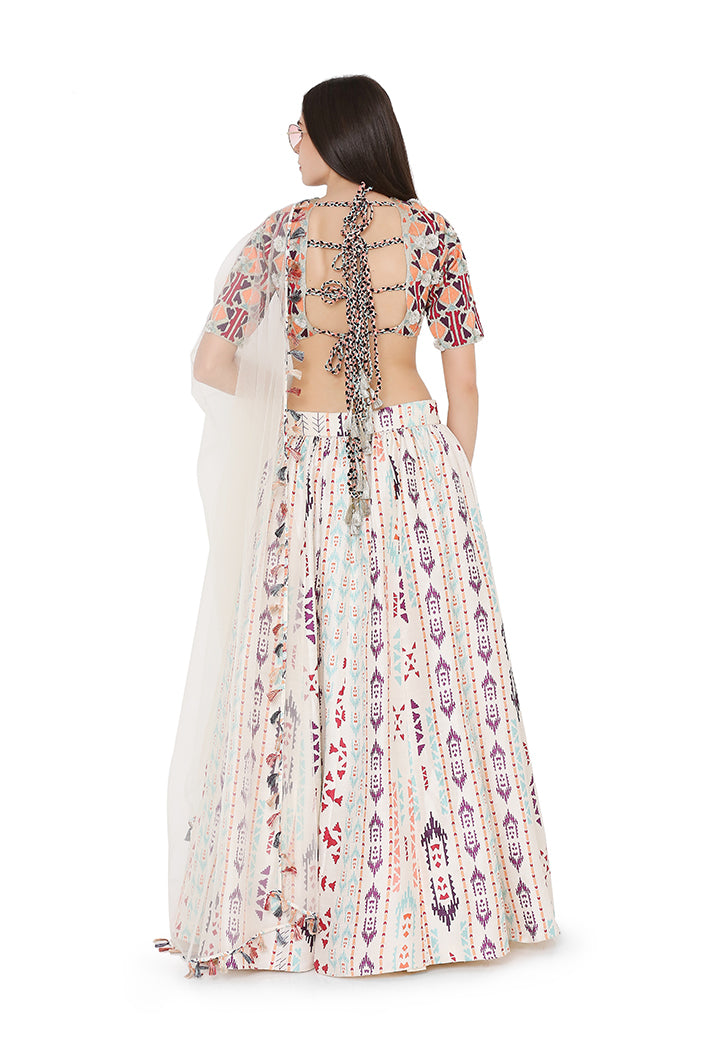 Cream Colour Crepe Back tie-Up Choli with Net Dupatta and Printed Lehenga