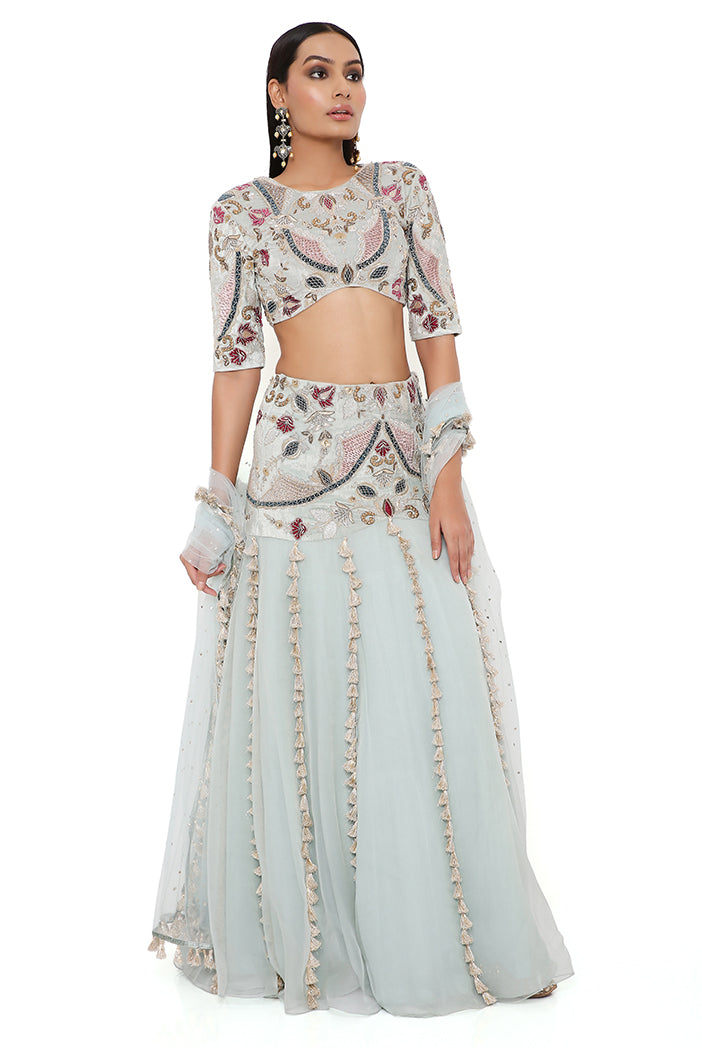 Kresha Powder Blue Velvet Embroidered Choli With Velvet Basque Organza Lehenga And Mukaish Net Dupatta