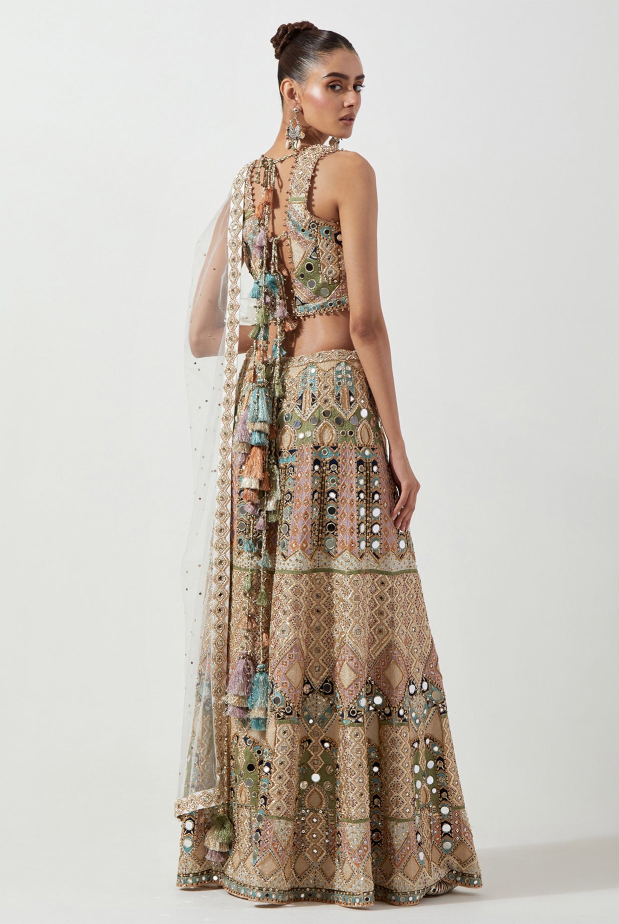 OFF WHITE EMBROIDERED CHOLI AND LEHENGA WITH MUKAISH NET DUPATTA