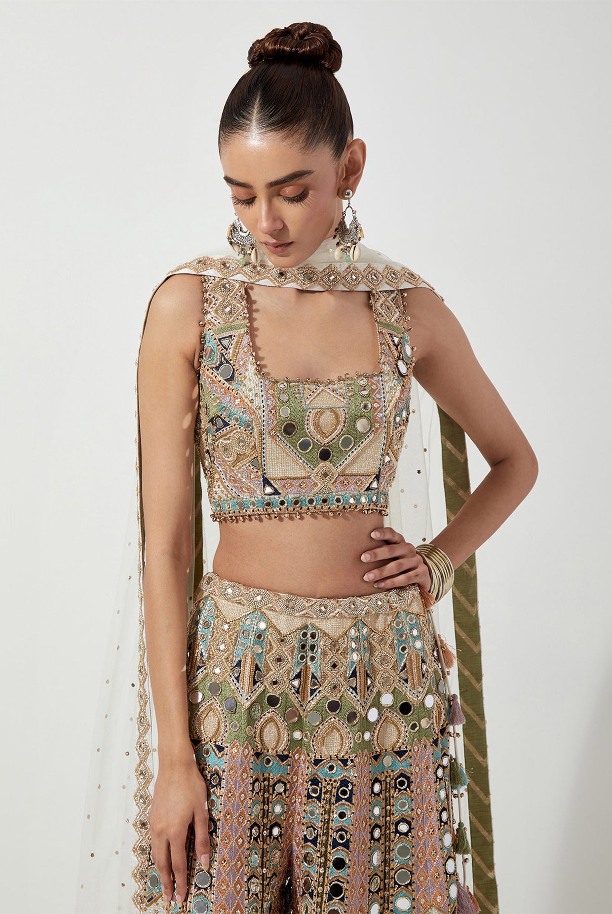 OFF WHITE EMBROIDERED CHOLI AND LEHENGA WITH MUKAISH NET DUPATTA