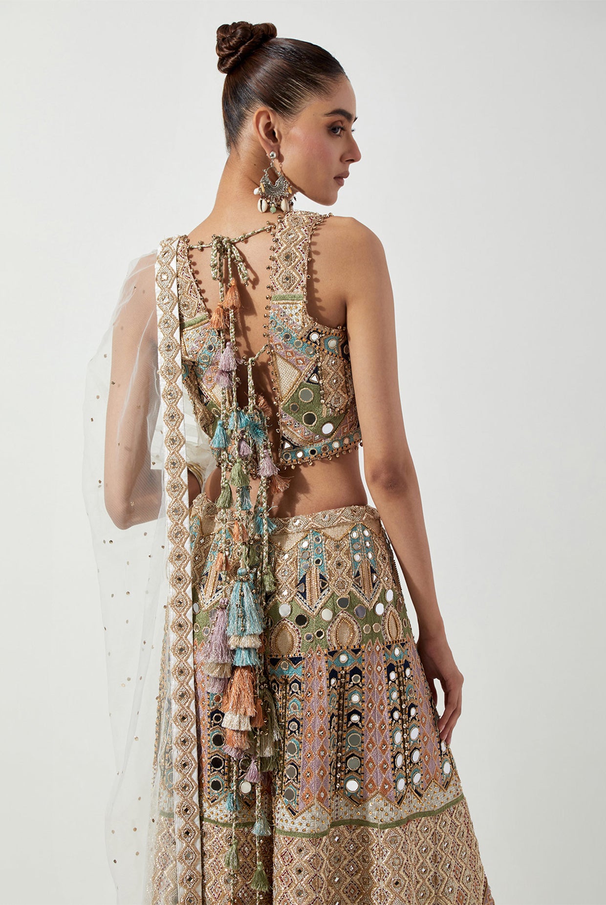 OFF WHITE EMBROIDERED CHOLI AND LEHENGA WITH MUKAISH NET DUPATTA