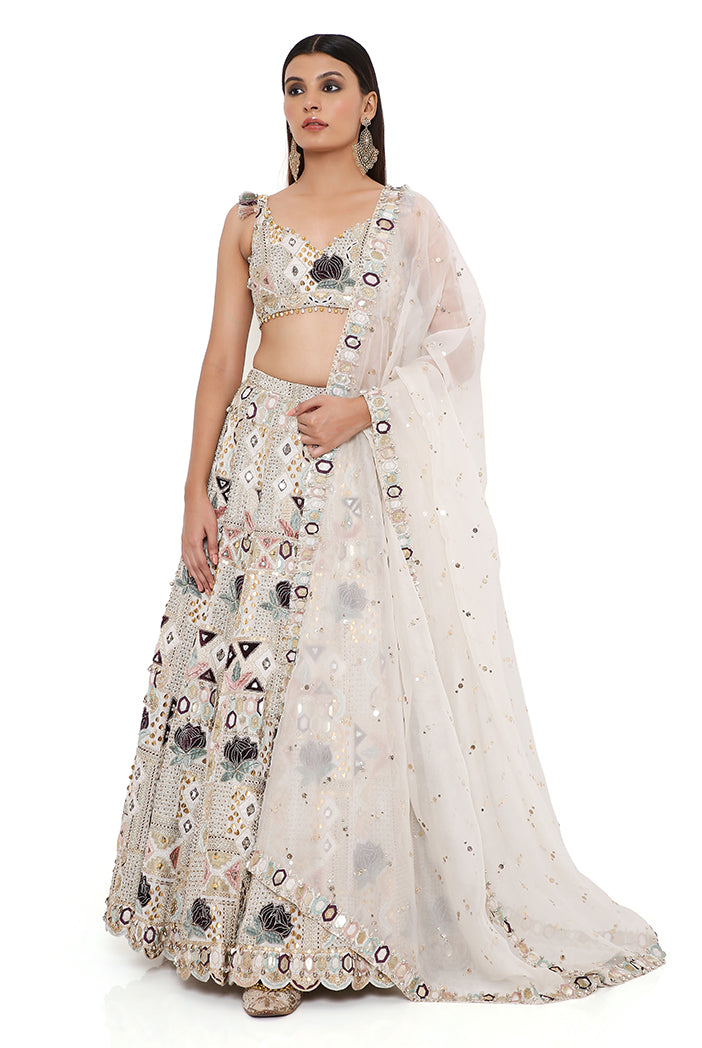 Padma Off White Georgette Embroidered Choli And Lehenga With Mukaish Organza Dupatta