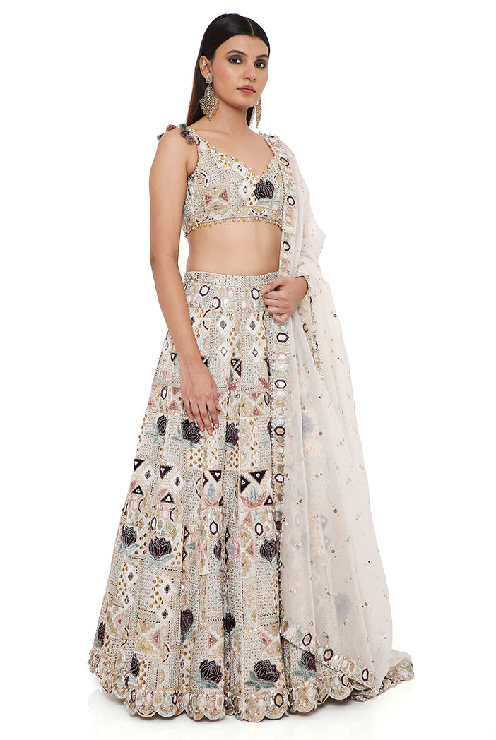 Padma Off White Georgette Embroidered Choli And Lehenga With Mukaish Organza Dupatta