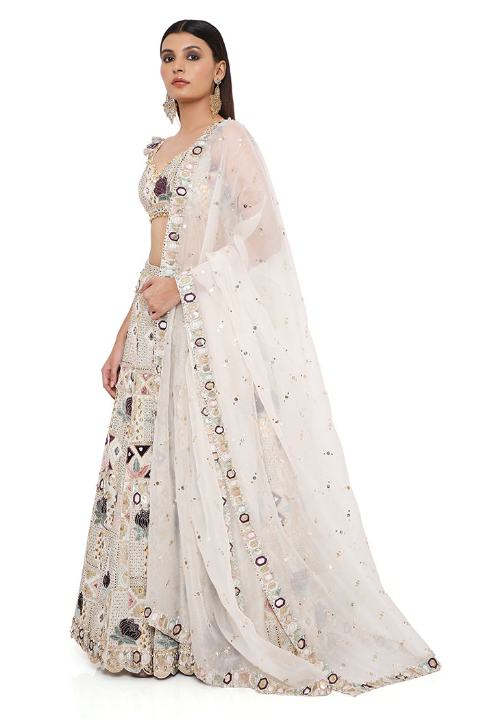 Padma Off White Georgette Embroidered Choli And Lehenga With Mukaish Organza Dupatta