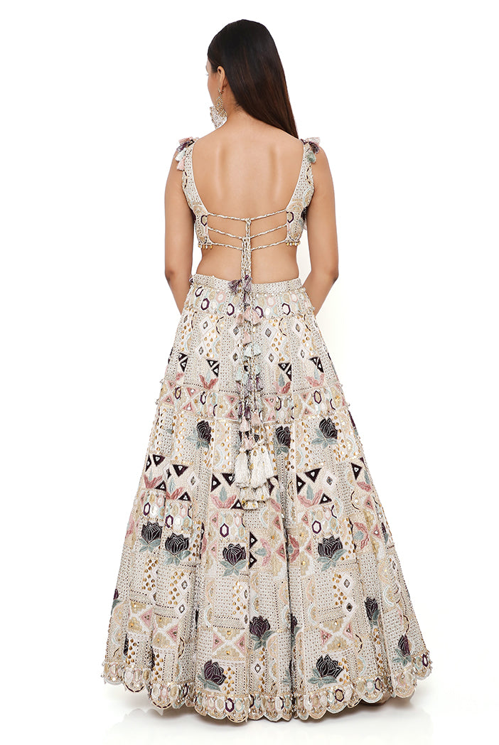 Padma Off White Georgette Embroidered Choli And Lehenga With Mukaish Organza Dupatta