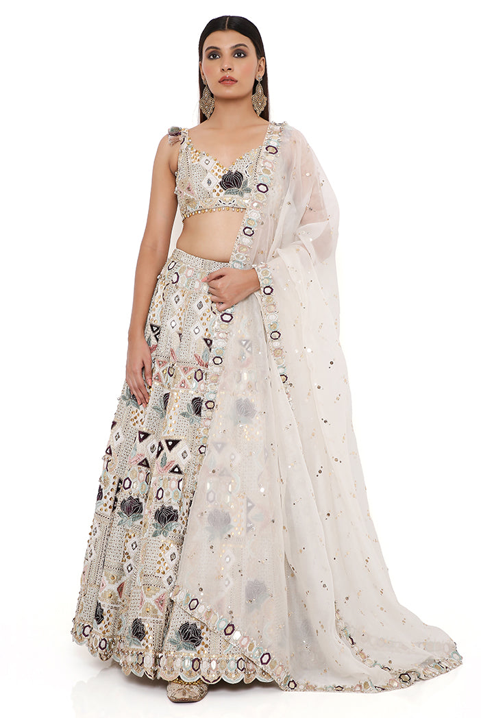 Padma Off White Georgette Embroidered Choli And Lehenga With Mukaish Organza Dupatta