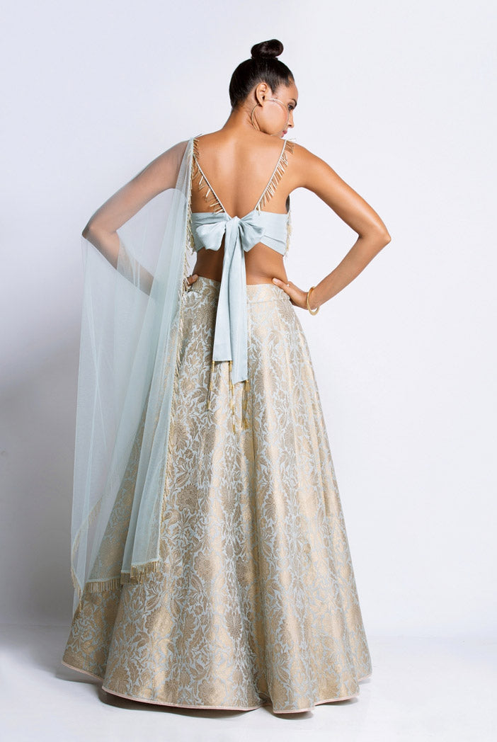 Powder Blue Silk Choli with Brocade Lehenga and Net Dupatta