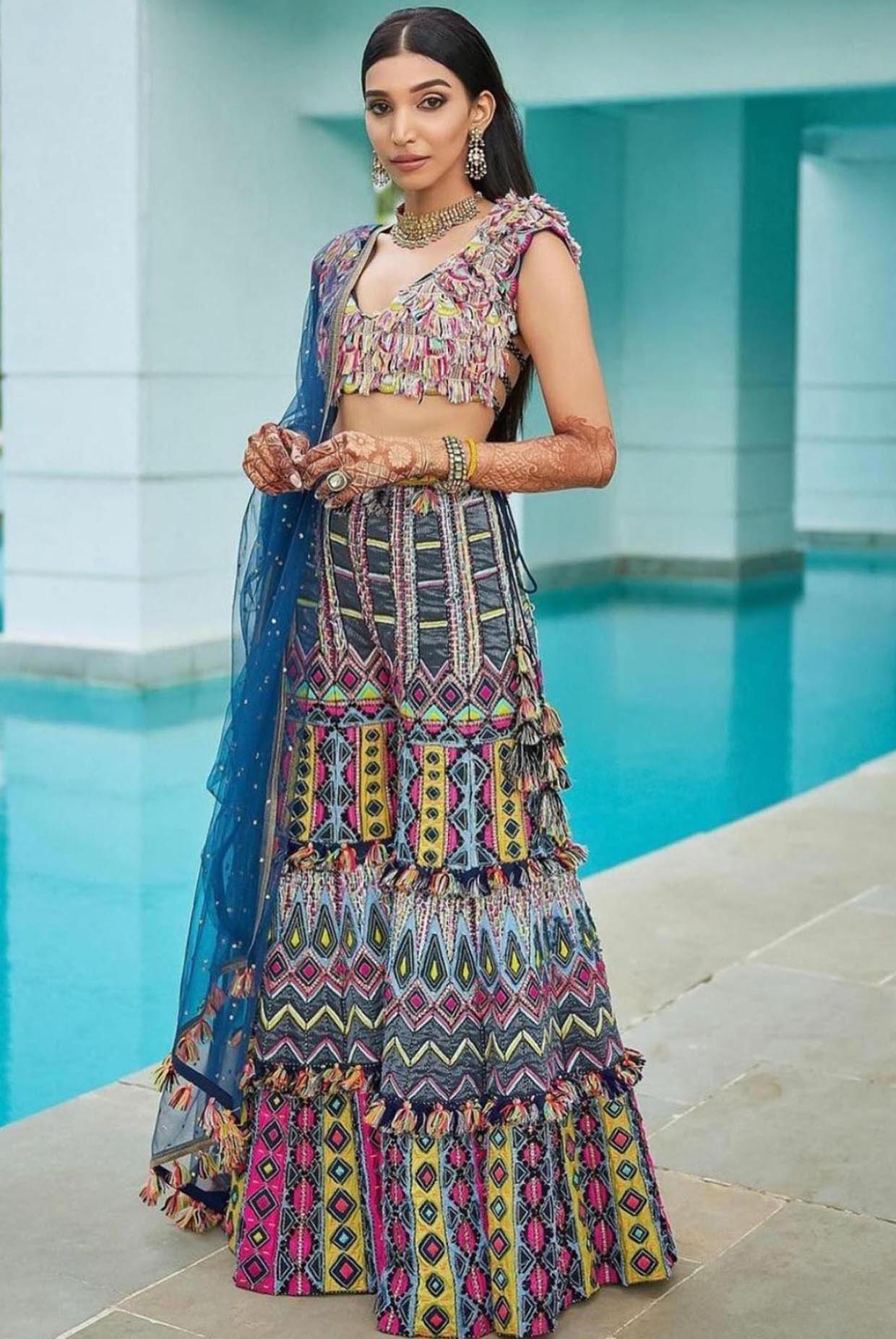 Navy Blue Georgette Embroidered Choli And Sharara With Mukaish Net Dupatta.