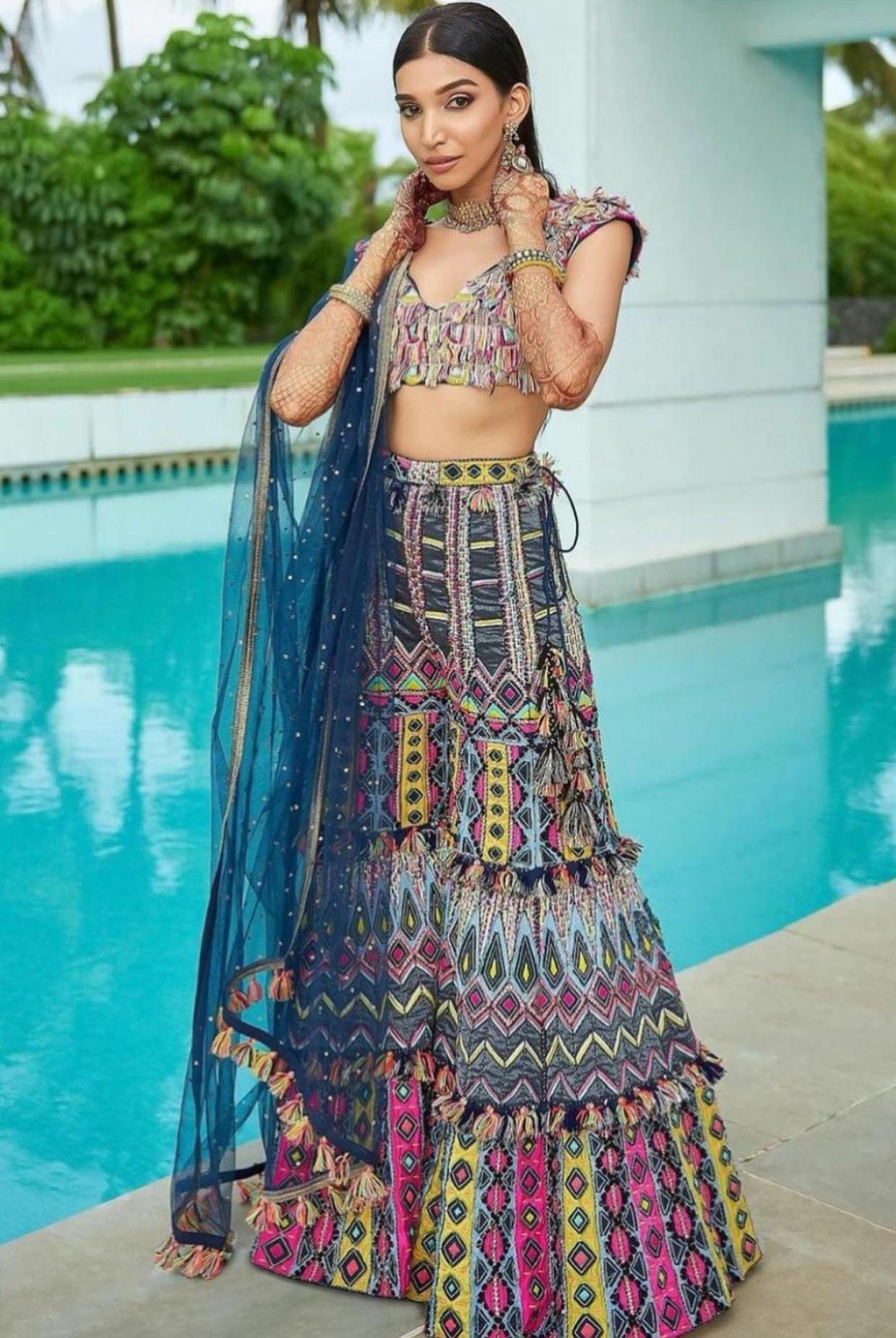 Navy Blue Georgette Embroidered Choli And Sharara With Mukaish Net Dupatta.
