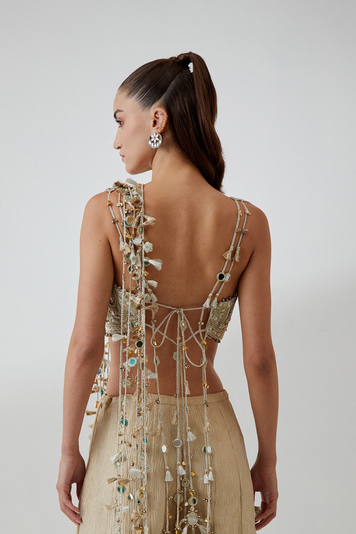 Off-White Organza Embroidered Choli And Gold Crushed Tissue Sharara With Attached Dori Tassels