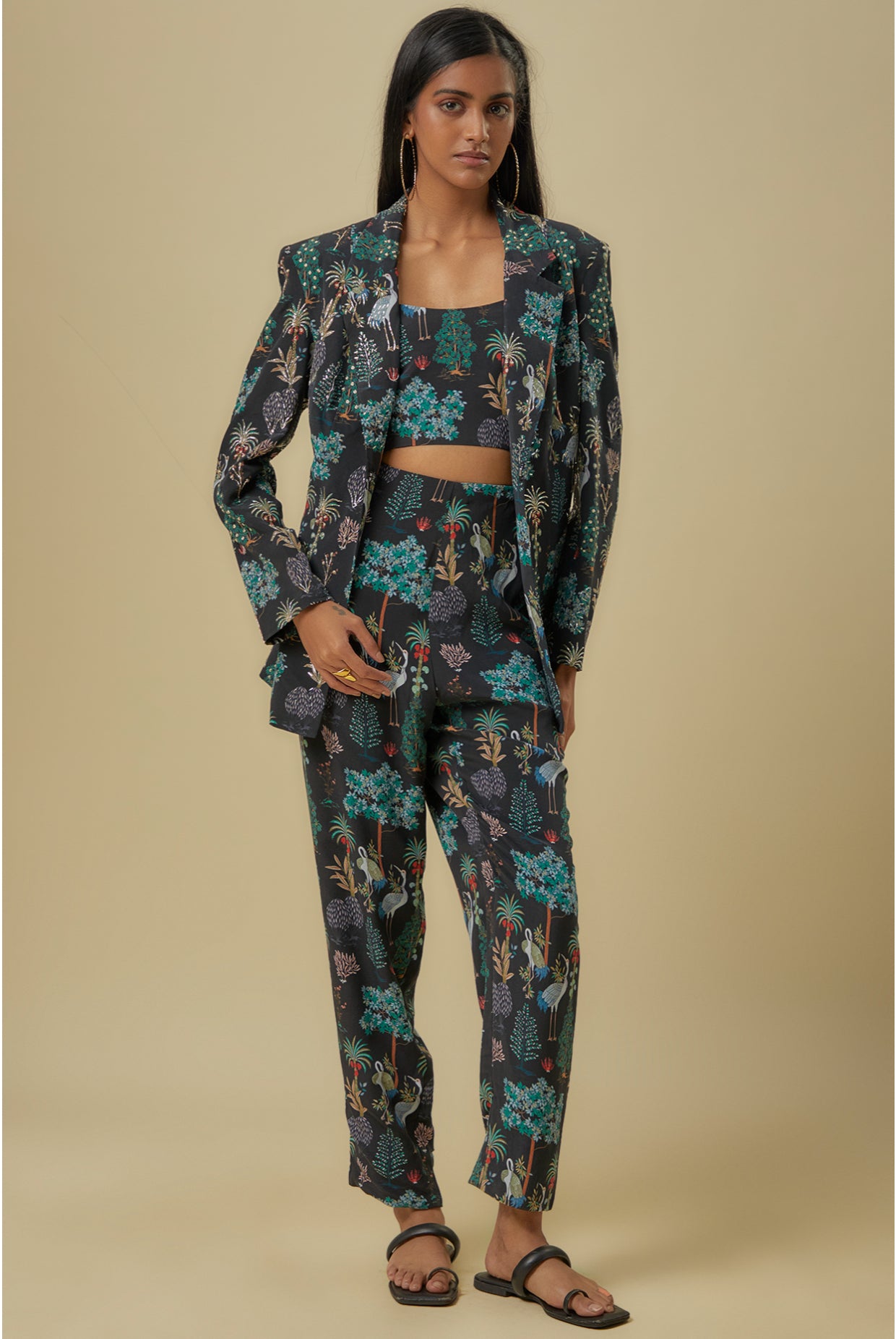 Black Crane Print Lifted Jacket With Plain Bustier And Pants.