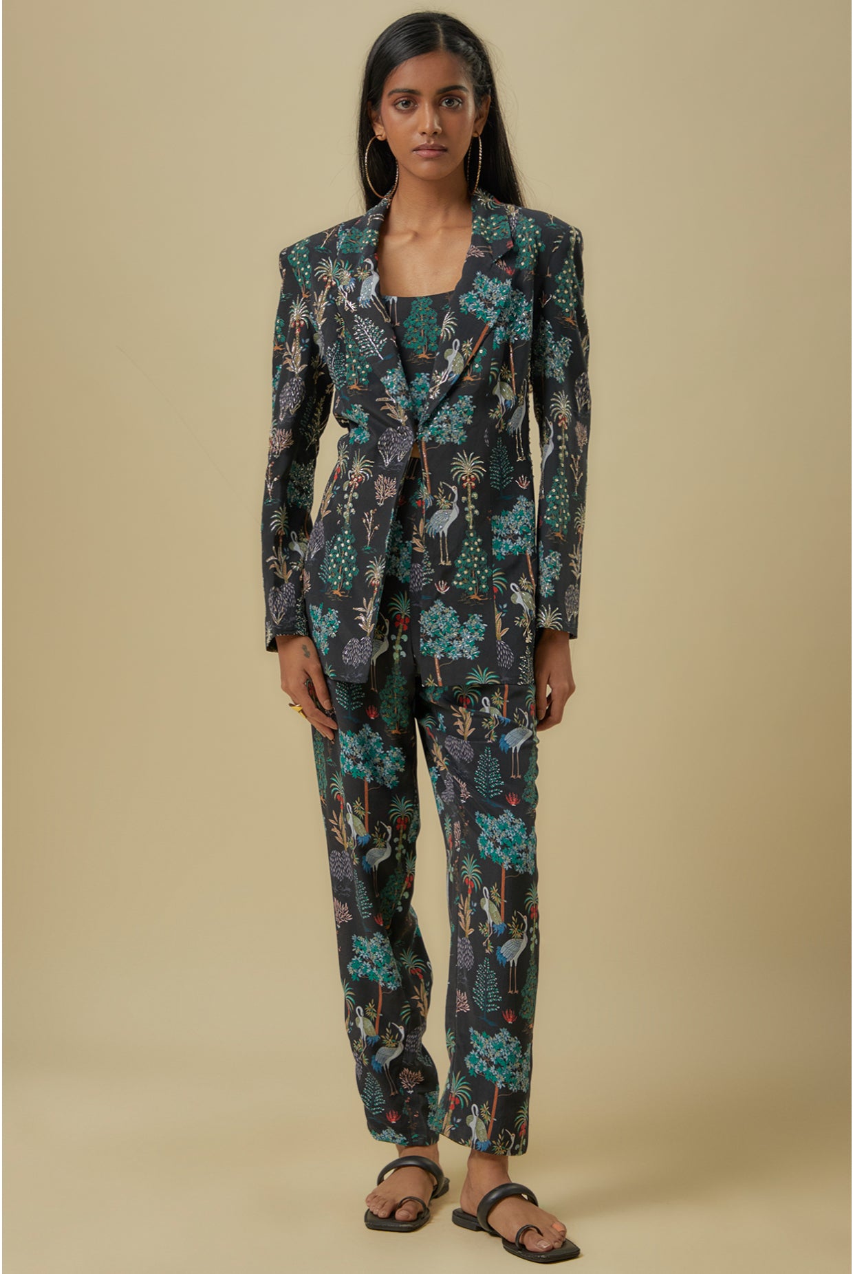 Black Crane Print Lifted Jacket With Plain Bustier And Pants.