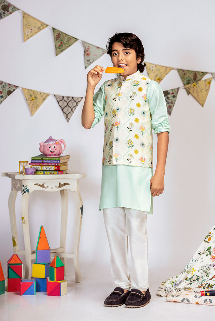 Cream Printed Silkmul Bandi with Aqua Cotton Silk Kurta and Off white Cotton Silk Churidar