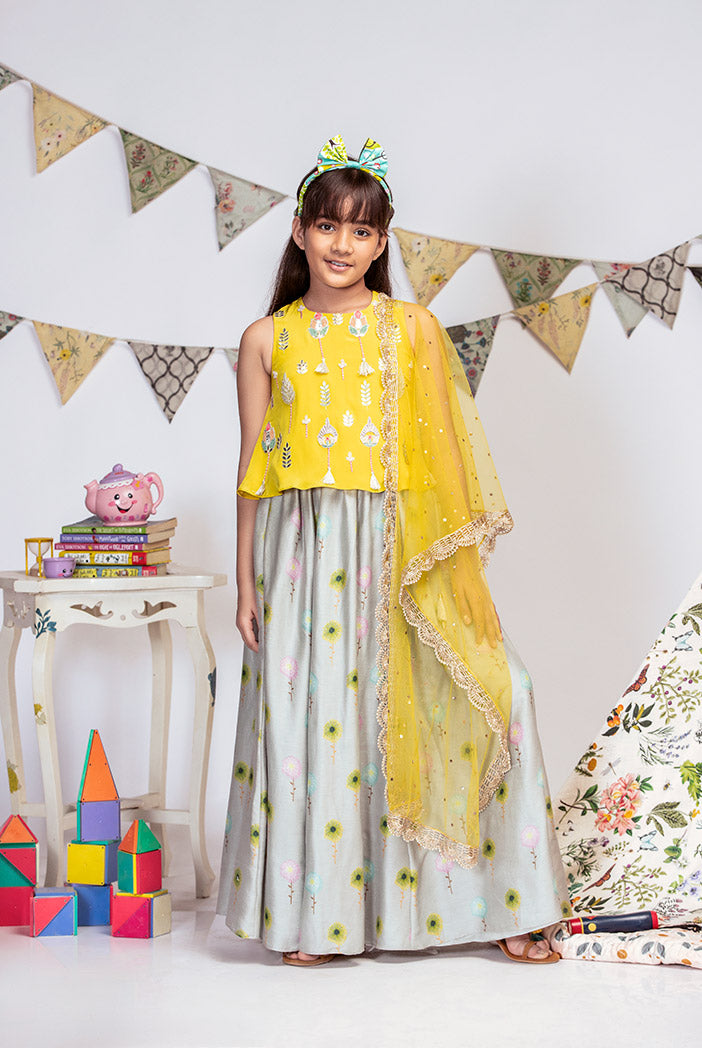 Yellow Crepe Top with Grey printed Silkmul Lehenga and Yellow Net Dupatta