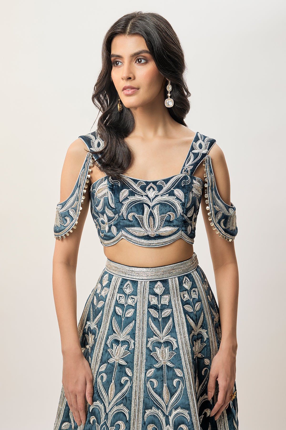 Sahar Navy Blue Velvet Quilted Embroidered Choli With Attached Embroidered Bajuband And Quilted Lehenga.