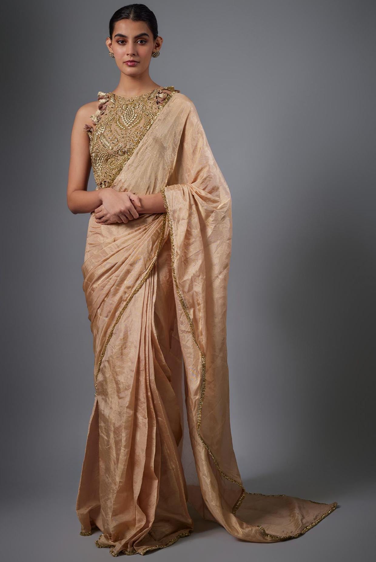 Dull Rose Color Embroidered Tissue Fabric Short Choli With Stitched Saree.