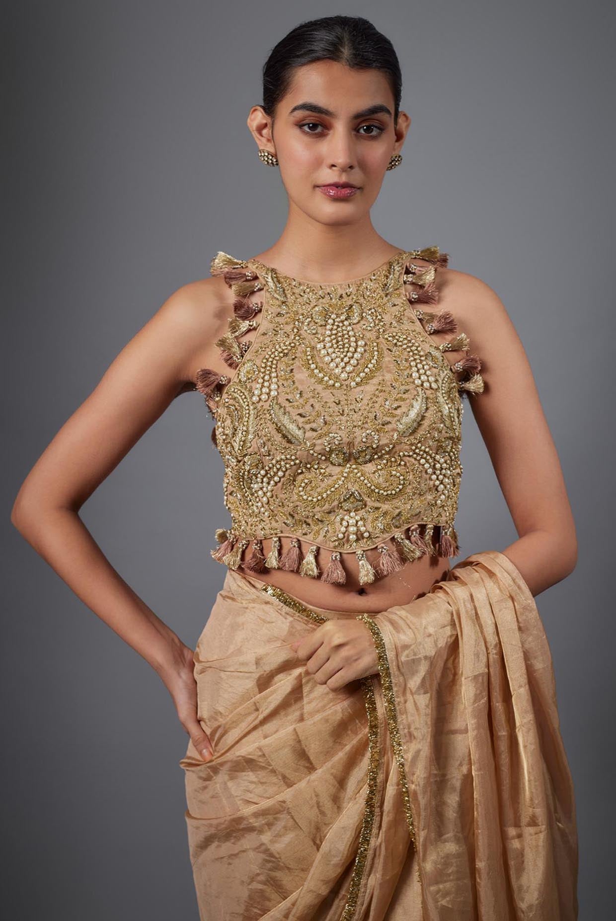 Dull Rose Color Embroidered Tissue Fabric Short Choli With Stitched Saree.