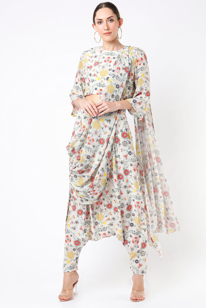 Cream Spring Print Georgette Crop Top With Low Crotch Pant And Attached Georgette Drape With Tassels