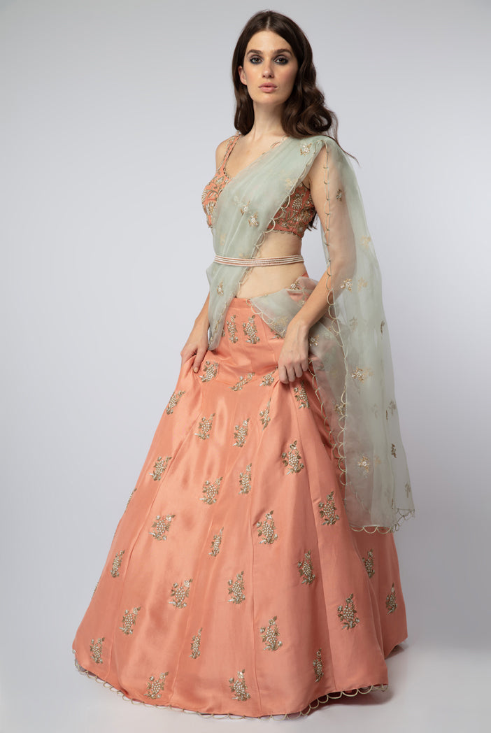 Coral Silk Choli with Lehenga and Mint Organza Dupatta with Waist Belt