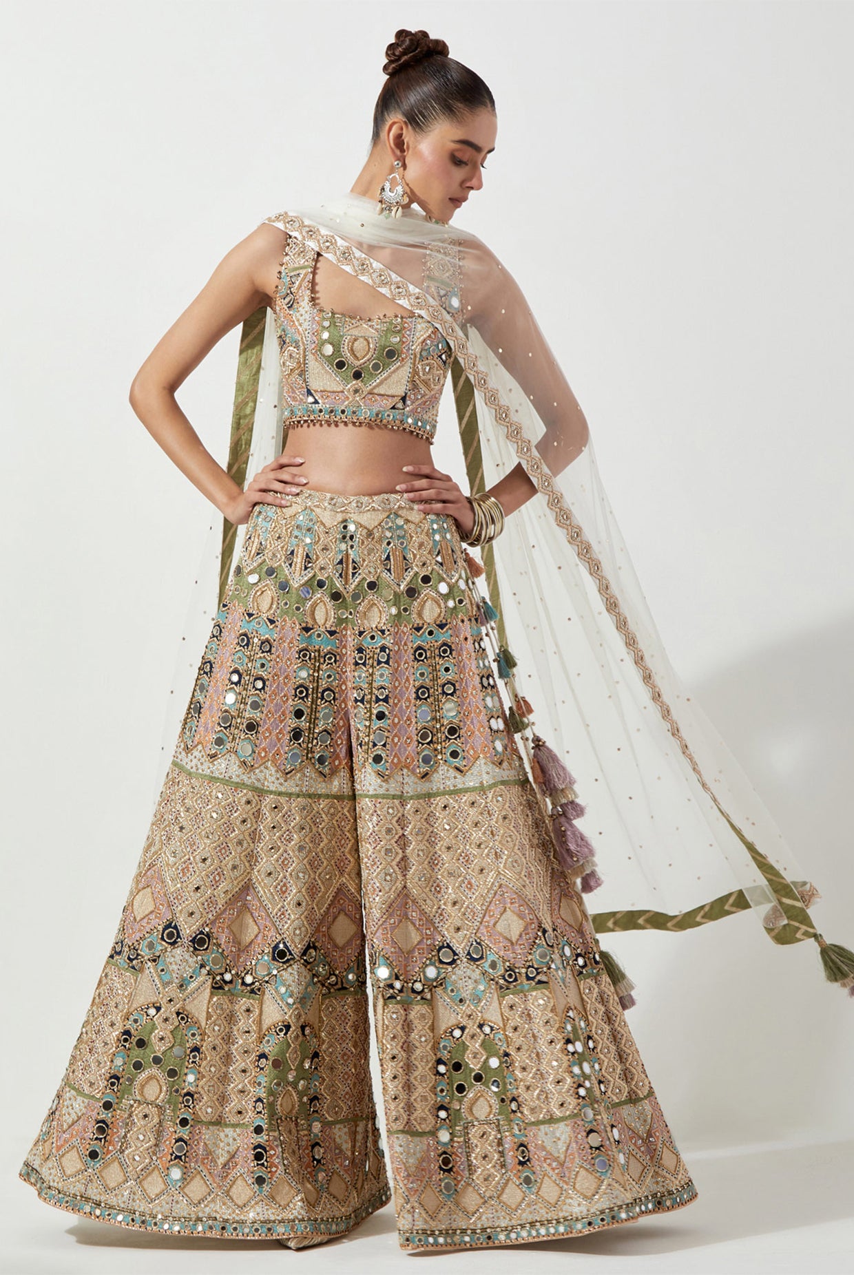 OFF WHITE EMBROIDERED CHOLI AND LEHENGA WITH MUKAISH NET DUPATTA