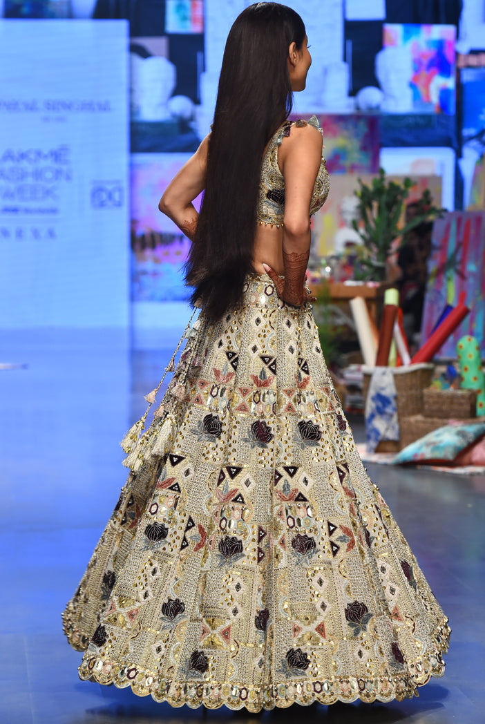 Padma Off White Georgette Embroidered Choli And Lehenga With Mukaish Organza Dupatta